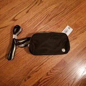 NWT Lululemon Black and Gold Belt Bag